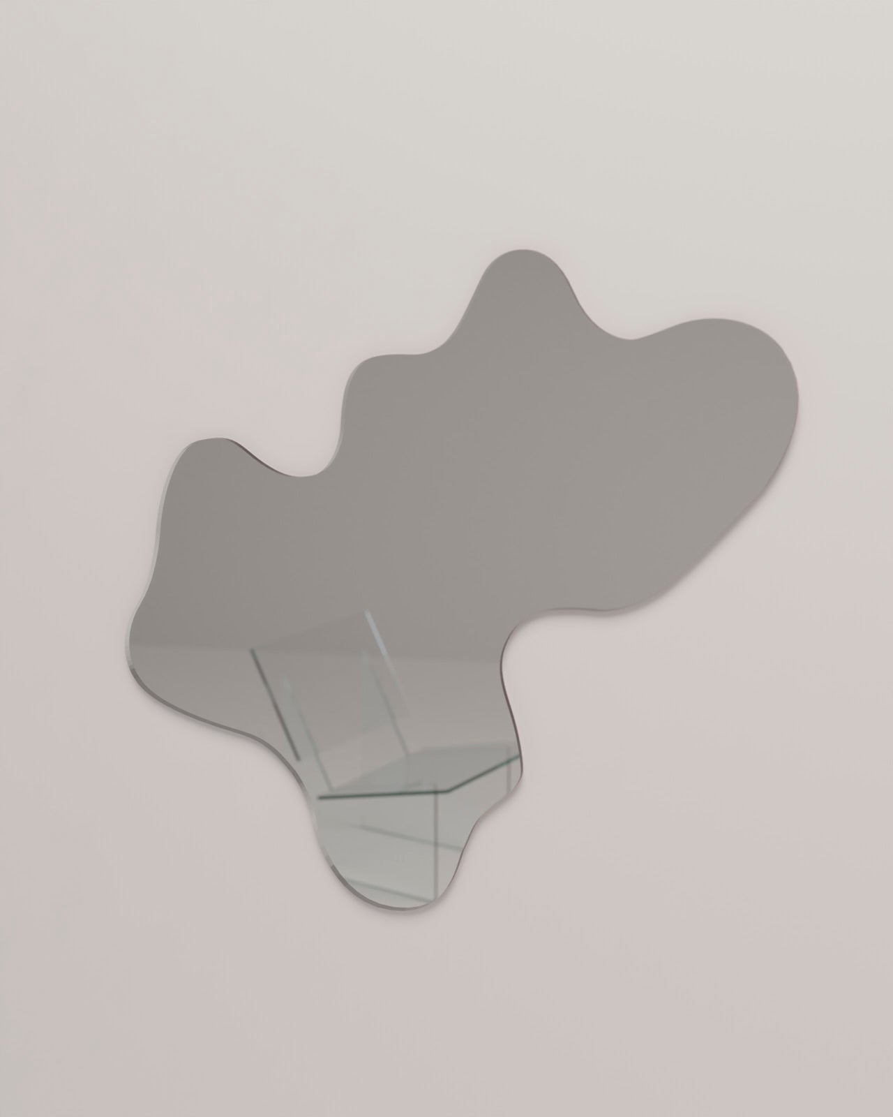 Miroir M en forme de flaque d’eau